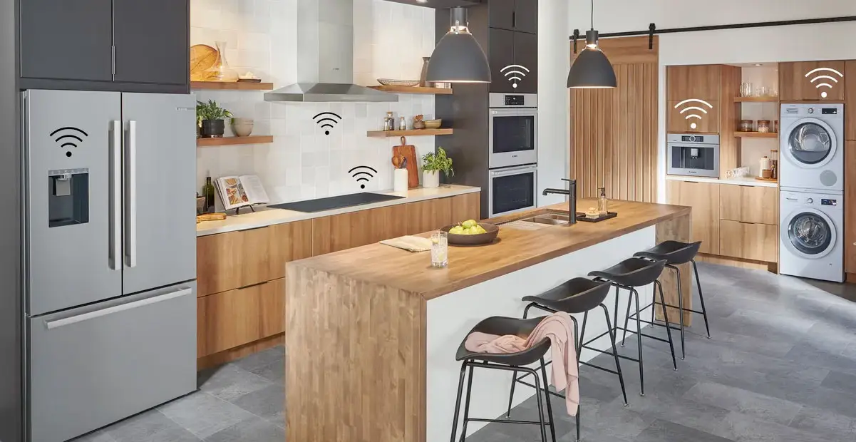 Appliance repair technician servicing a luxury kitchen in Newport Beach